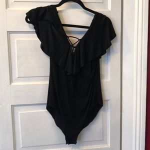Black ruffle lace up body suit